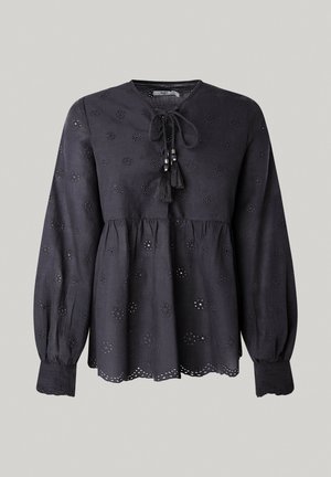 Top negro de manga larga con cuello redondeado, cierre frontal con lazo, patrones de ojales florales y dobladillo en forma de ondas. Fabricado con tejido ligero.