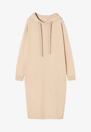 Beige ülemõõdulise kapuutsiga kleit, mis on valmistatud pehmest kangast. Omab kapuutsi, soonikuid mansettides ja reguleeritavaid nööre. Kergelt tekstureeritud, minimaalne disain.