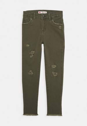 Olijfgroene skinny jeans van denim, met gescheurde details en rafelende zomen. Vijf-pocketdesign met een knoopsluiting.