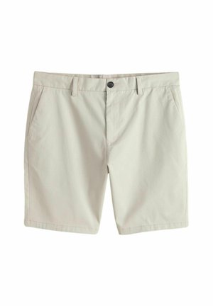 Beežid meeste vabaajashortsid nööpklapiga, vööaugudega, küljetaskutega ja esikülje detailse viimistlusega valgel taustal.