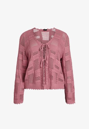 Pink knit cardigan with open-weave patchwork design, long sleeves, ribbed cuffs and hem, and front ties at neckline and chest.