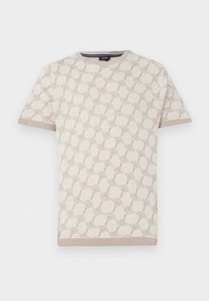 Maglione a maniche corte color crema realizzato in maglia con un motivo astratto marrone chiaro. Collo a girocollo e polsini a coste, con una texture liscia. Etichetta del marchio visibile.