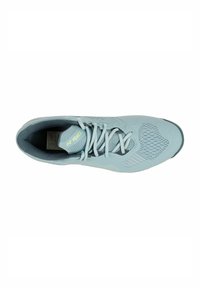 Light blue athletic shoe with a textured upper, mesh accents, flat laces, and rubber sole. "Yonex" logo visible on the side.