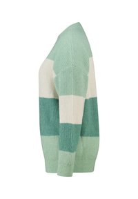 Pull rayé vert et crème avec une texture côtelée, une coupe décontractée et un col en V. Fabriqué en tricot doux et texturé.
