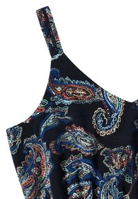 Tissu noir avec un motif cachemire coloré en bleu, rouge, vert et blanc sur un vêtement à fines bretelles.