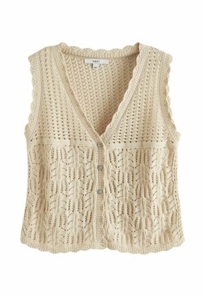 Gilet beige sans manches en tricot avec col en V, bords festonnés et trois boutons décoratifs sur le devant.