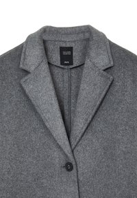 Cappotto grigio in lana con colletto a scollo e chiusura a un bottone nero. L'etichetta interna indica la taglia XS/S. Tessuto morbido e testurizzato.