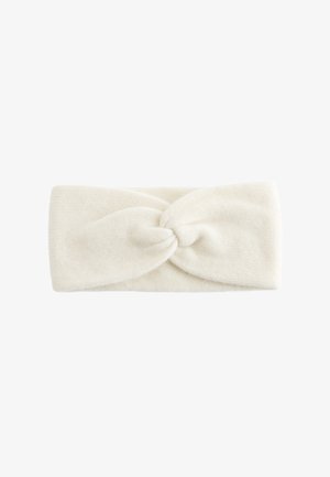 Knit headband in cream with a twisted front design. Soft texture and flexible material for comfort and warmth. Suitable for various head sizes.