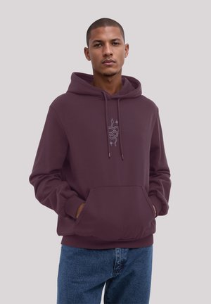 Bordeauxfarbene Kapuzenpullover aus weichem Stoff mit einer vorderen Tasche. Verfügt über ein besticktes Design auf der Brust und gerippte Bündchen.