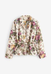 Blusa con motivo floreale in crema, caratterizzata da fiori viola e gialli. Maniche lunghe, colletto, bottoni e dettaglio con vita annodata. Tessuto dalla texture morbida.