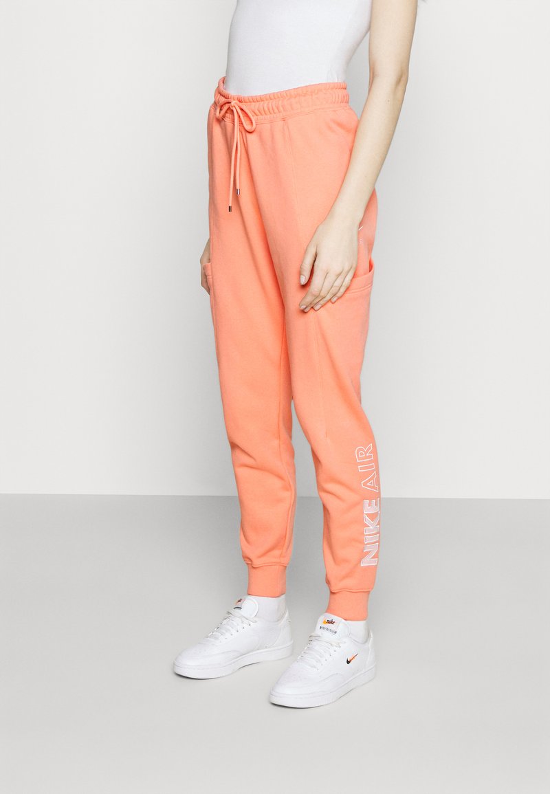 Nike Sportswear AIR PANT Trainingsbroek crimson bliss/koraalrood