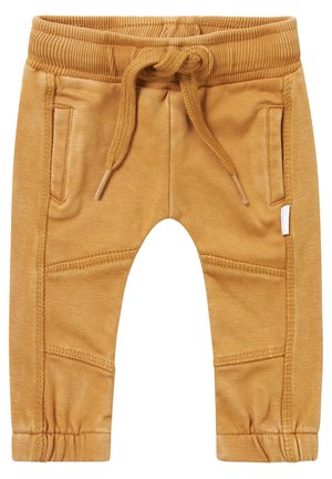 Dziecięce spodnie dresowe w kolorze musztardowej żółci, z elastycznym paskiem w talii, sznurkiem do regulacji, bocznymi kieszeniami oraz przeszyciami na kolanach.
