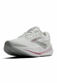 Scarpa sportiva bianca con superiore texturizzato, dettagli in rosa chiaro e suola ammortizzata con un design ondulato. Marchio visibile di lato.