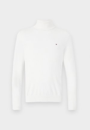 Suéter de gola alta branco, feito de um material de malha suave, com mangas longas e um pequeno logotipo no peito. Design simples e ajustado.