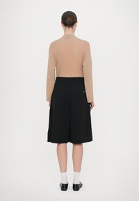 Armani Exchange BERMUDA - Shorts - black denim
