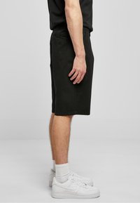 Urban Classics BIG  - Šorti - black