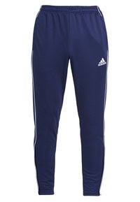 Marinblå Adidas träningsbyxor med vita sidostycken, elastisk midja, tapered ben och Adidas-logotyp på höger lår.