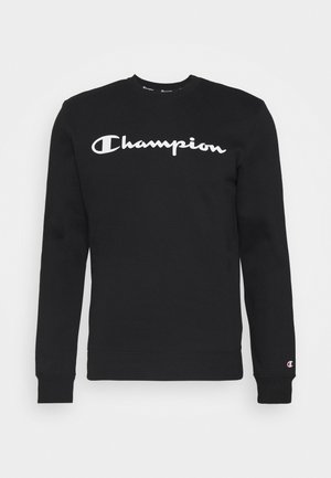 Černá mikina s dlouhým rukávem a kulatým výstřihem s bílým logem "Champion" přes prsa a malým logem Champion na levém manžetu.