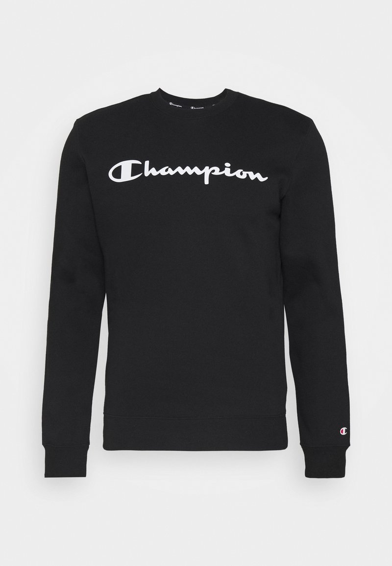 Sweat-shirt noir à manches longues avec col rond, logo blanc "Champion" sur la poitrine et petit logo Champion sur le poignet gauche.