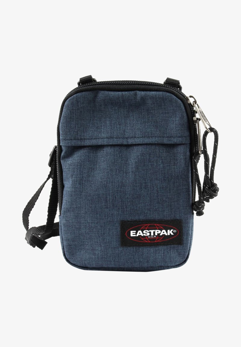 Borsa a tracolla blu in tessuto con zip superiore, tasca anteriore, dettagli neri e logo Eastpak. Dotata di una tracolla regolabile e superficie strutturata.