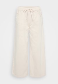 Wide-leg, cream-colored cotton pants with an elastic waistband, drawstring, and side pockets. Smooth texture, casual design.