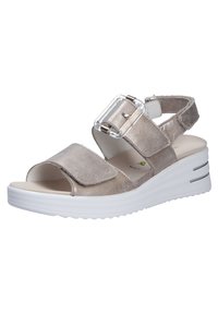 Metallic grey sandal with wide fabric straps, adjustable clear buckle, and white wedge sole featuring horizontal grooves. Open toe design.
