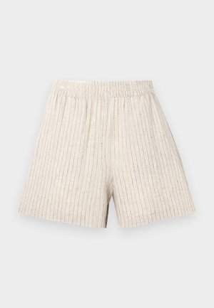 Light beige shorts with vertical ribbed texture, elastic waistband, and relaxed fit. Fabric is soft and breathable.
