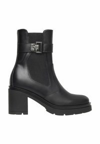 Black leather ankle boot with block heel, elastic side panel, and decorative silver buckle strap on a white background.