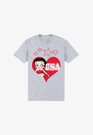 T-shirt gris avec un graphique de cœur rouge représentant une femme dessin animé en robe rouge, texte "USA" et cinq étoiles rouges en contour au-dessus.
