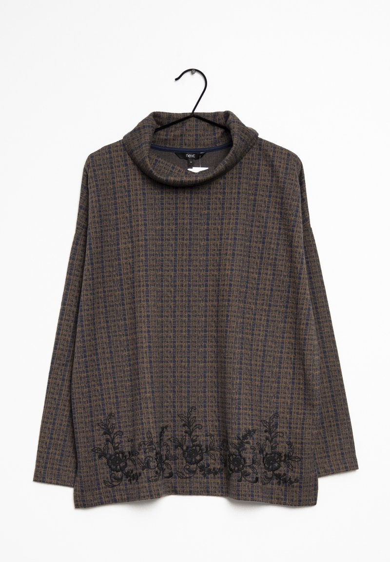 Pull à col roulé à manches longues à carreaux marron et bleu marine avec broderie florale noire le long de l'ourlet inférieur, suspendu à un cintre noir.