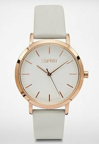 Runde Uhr mit einem weißen Zifferblatt, Gehäuse aus Roségold und schlanken Indizes in Roségold. Verfügt über ein hellgraues Lederarmband mit glatter Textur.