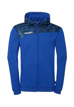 Sweat à capuche bleu à fermeture éclair complète avec motif géométrique foncé sur les épaules, poignets élastiques, poches latérales zippées et logo "Kempa" sur la poitrine.