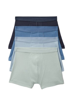 Quatre boxers en coton dégradés de bleu, disposés en pile, vue de face.