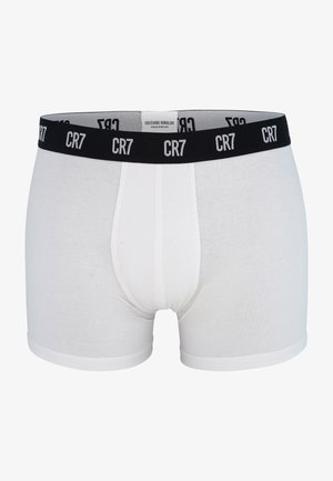 Białe bawełniane bokserki z czarnym elastycznym pasem w talii z logo "CR7". Miękka faktura, dopasowany fason i szczegół kieszonkowy z przodu.