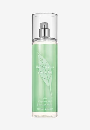 Bouteille en verre vert avec un capuchon transparent, arborant un design de feuille vert clair et un texte blanc. Capacité : 236 ml, étiquetée "Brume de parfum fine."