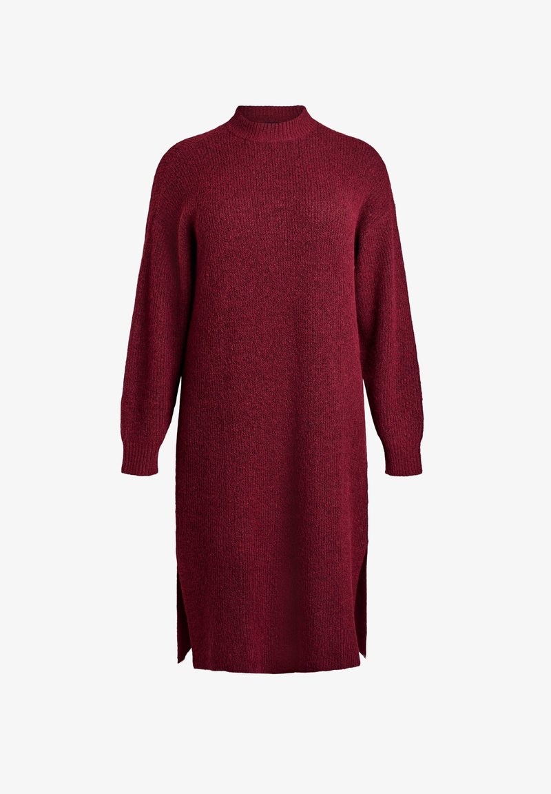 Robe-pull en maille bordeaux à manches longues, avec poignets côtelés, col montant et fentes latérales, présentée sur un fond blanc.
