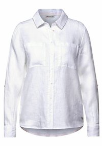 White linen shirt with a collared neckline, two chest pockets, and a button-down front. Features long sleeves with roll-up options.