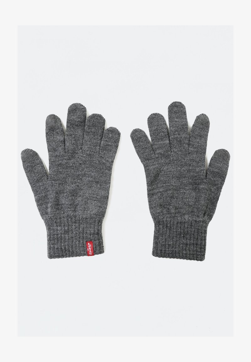 Gray knitted gloves with a ribbed cuff. Textured fabric and a small red tag on the wrist enhance the design. Suitable for cold weather use.
