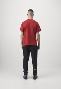 The North Face MOUNTAIN ATHLETICS HYBRID PANT - Szabadtéri nadrágok - black