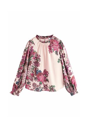 Blusa a stampa floreale in rosa chiaro, con maniche lunghe a polsini elasticizzati, scollatura arricciata e grandi motivi floreali colorati.