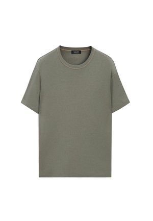 T-shirt a maniche corte con scollo rotondo in verde oliva opaco uniforme con cuciture visibili intorno al collo e alle maniche.