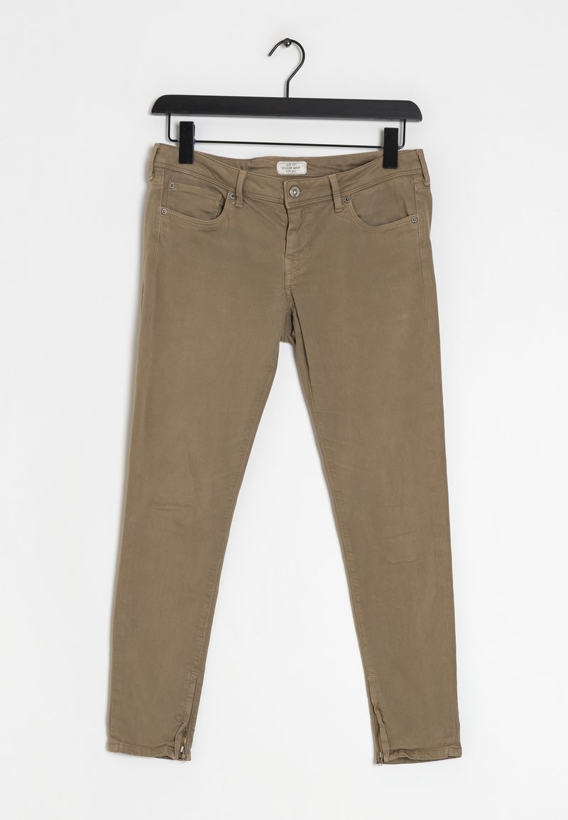 Bruine, slim-fitting broek met vijf zakken, een ritssluiting bij de enkel en een gladde katoenmix stof. Gepresenteerd op een hanger tegen een witte achtergrond.