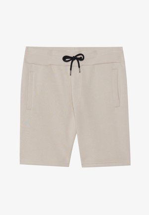 Shorts beiges en tissu doux, dotés d'une taille élastique avec un cordon noir et de deux poches latérales. Design simple et coupe droite.