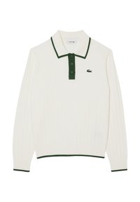 Wit poloshirt met lange mouwen, groene kraag en knopen, geribbelde textuur en een klein groen Lacoste-logo op de linkerborst.