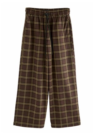 Bruine geruite wijde broek met een elastische tailleband en trekkoord. Heeft een ruitpatroon met gele accenten en een zachte textuur.