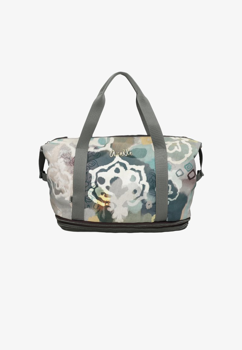 Canvas weekendtas met abstract bloemenpatroon in gedempte blauwtinten, grijstinten en gele accenten, met grijze handvatten en de naam "Anekke" aan de voorkant.