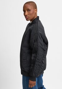 adidas Originals Giacca invernale - schwarz