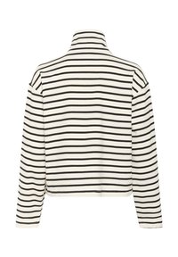 Ribakujuline pullover jakk musta ja valgega, millel on kõrge krae, pikad varrukad ja lühike sobivus, millel on sile tekstuur.
