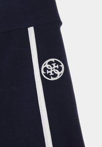Guess HARPER - Leggings - blau