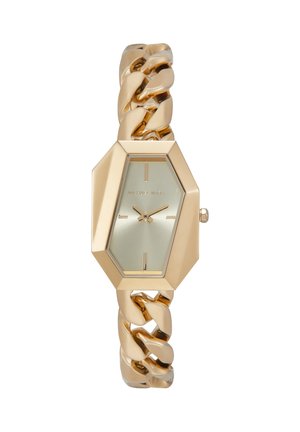 Montre-bracelet dorée avec un cadran hexagonal géométrique et un bracelet à maillons épais, marquages minimalistes sur le cadran et sans chiffres visibles.